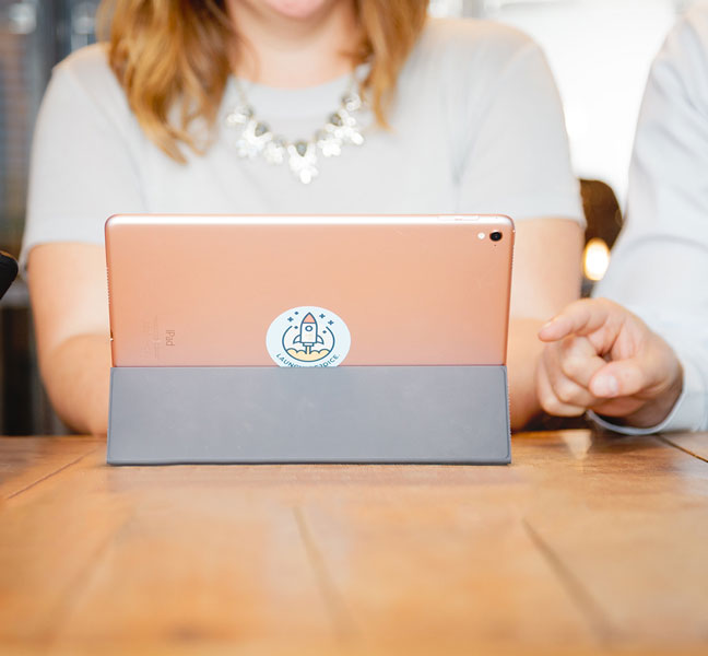 Woman blogging on tablet